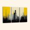 Картина з декількох частин чорні хмарочосі на жовтому фоні